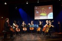 Orchester mit jungen Cellisten auf der Bhne